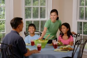 Family enjoying home-cooked dinner