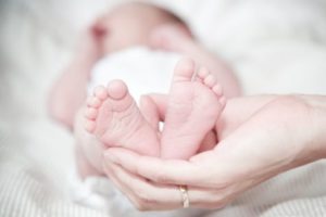 Mother holding newborn baby
