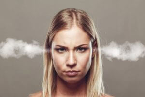 Angry woman with smoke coming from ears