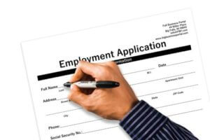 Person filling out job application