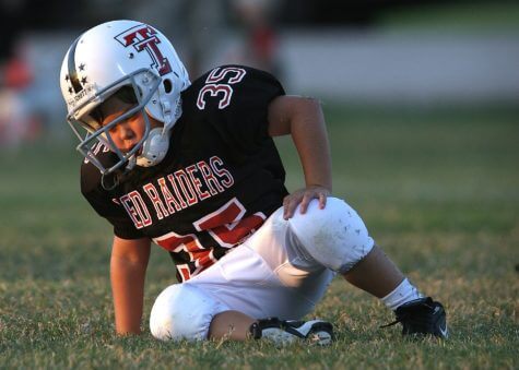 Child playing youth footballl