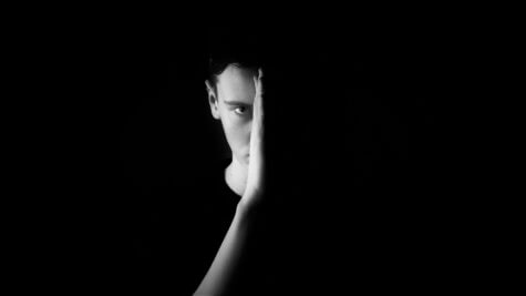 Black students who have suspicious views of white people's motives don't trust smiling white faces, new studies find.