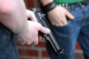 Person holding a handgun