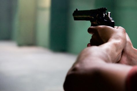 Person shooting gun
