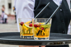 Server with two glasses of sangria