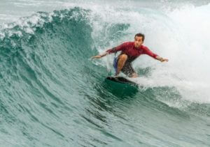 Surfing man on surfboard