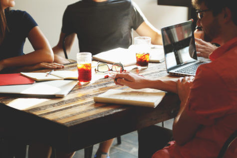 Group of people sitting at table
