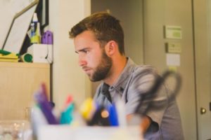Man sitting at a desk in an office