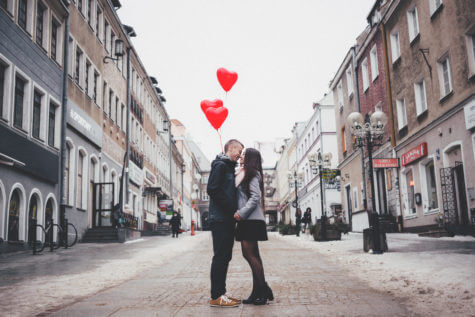 Couple kissing in middle of street