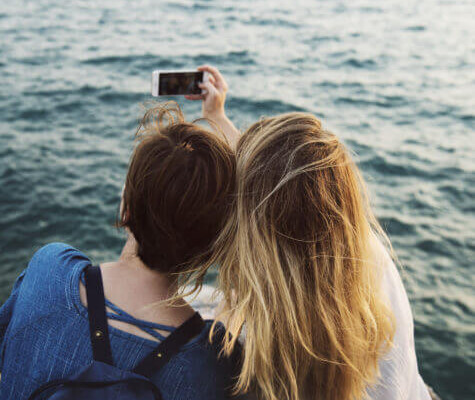 Girlfriends taking a selfie