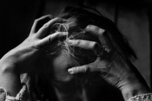 Woman feeling stressed, frustrated