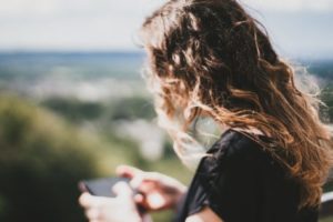 Teen on smartphone