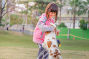 Little girl with dog