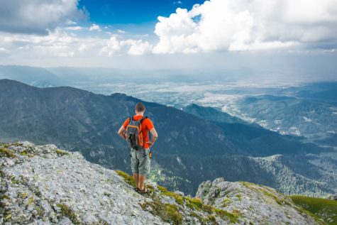 Man atop mountain