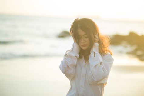 Sad woman on beach