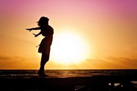 Woman alone at sunset