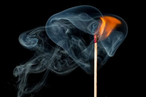 Lit match with flame