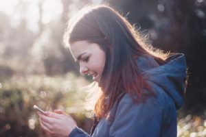 Woman checking her smartphone