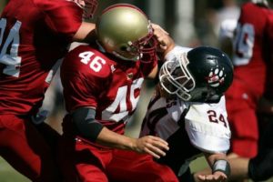 Tackle in football game