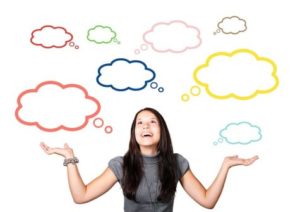 Woman thinking with thought bubbles