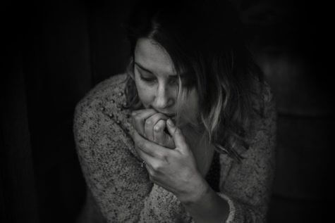 Woman feeling stressed, anxious