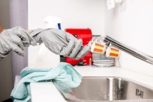 Person cleaning house