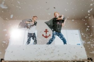 Children having pillow fight