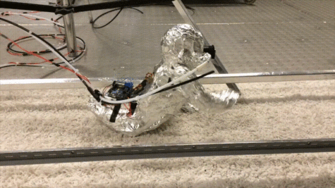 Robotic baby crawling on floor