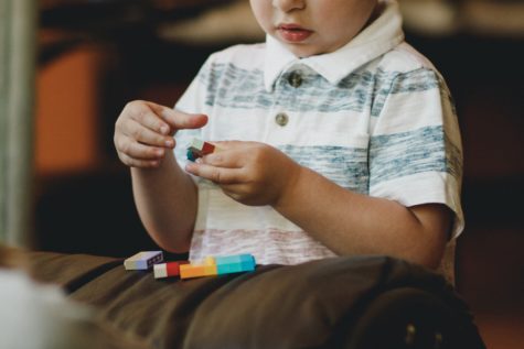 Young boy playing with blocks