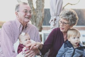 Elderly couple with kids