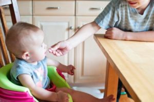 Baby eating solid food