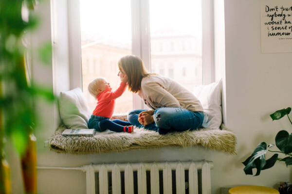 Mother playing with baby