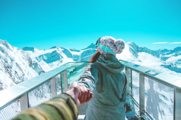 Couple on snowy mountain