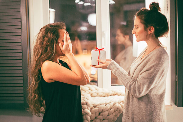Woman giving gift