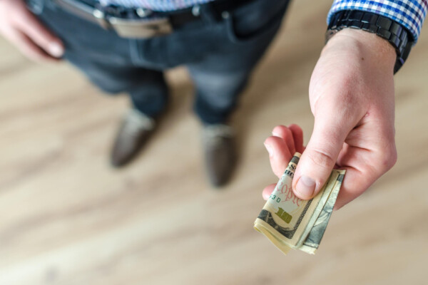 Person giving money