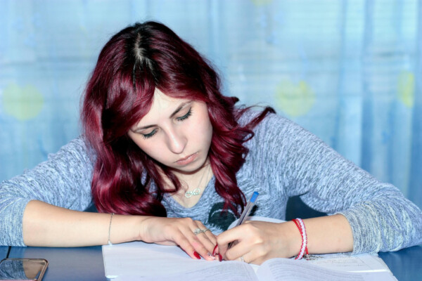 Girl doing work at desk