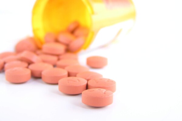 Medicine bottle with pills
