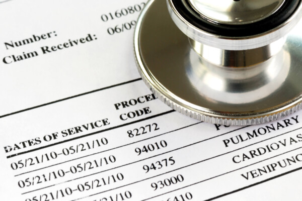 Medical bill with stethoscope