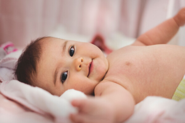 Happy baby lying down
