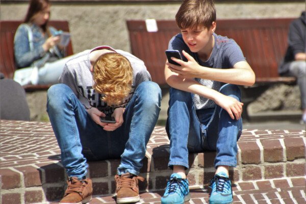 Teens using smartphones