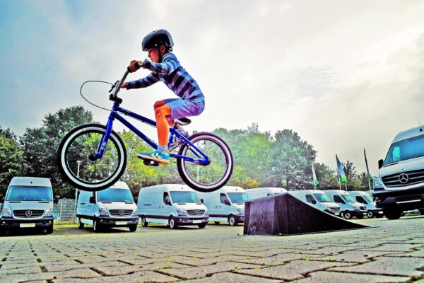 Child wearing helmet while on bicycle