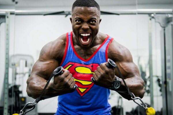 Muscular man working out at gym