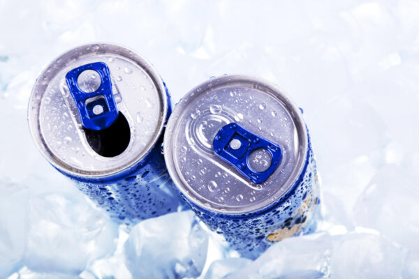 Energy drink cans on ice