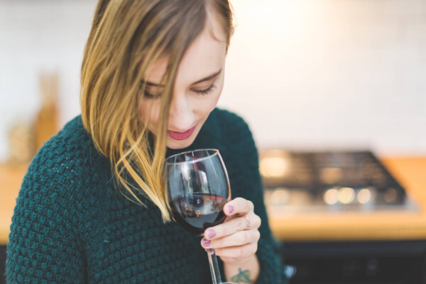 Woman drinking red wine