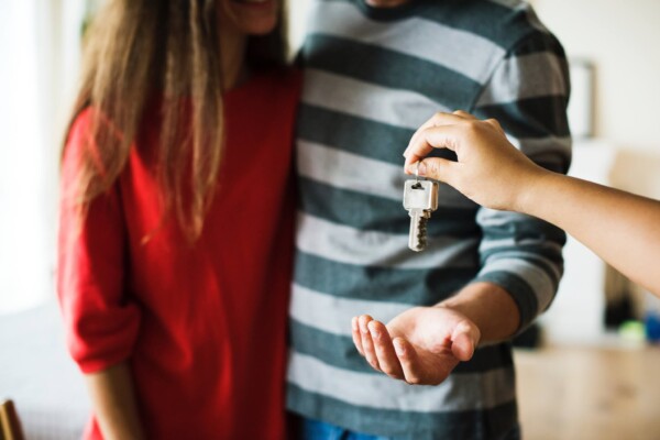 Couple getting keys to new home