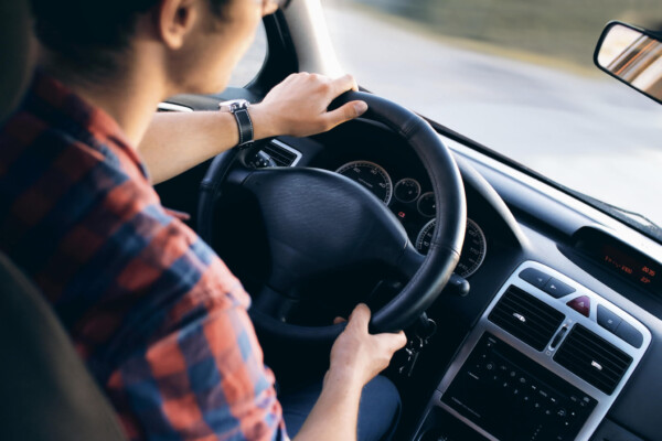 Man driving his car