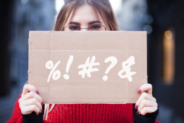 Woman swearing, using curse words