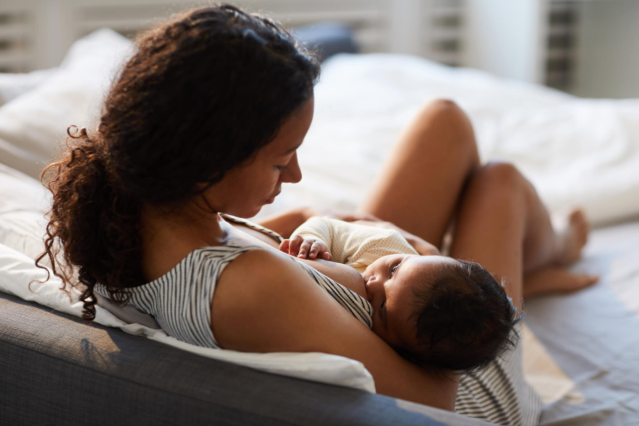 Mother breastfeeding baby