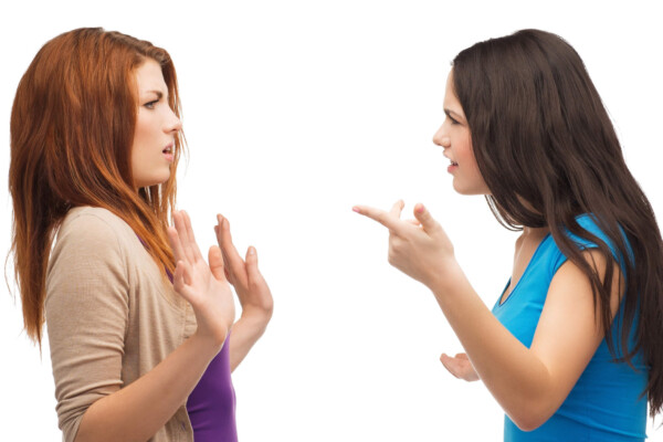 two teenagers having a fight
