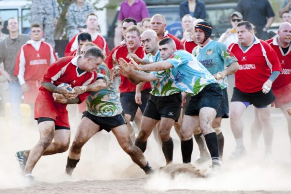 Player nearly tackled during Rugby match
